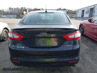 2015 Ford Fusion Energi Titanium with VIN 3FA6P0SU8FR189159, listed as a IAAI auction lot 41595744 with 170,558 mi miles. Bid and sale history available at carsss.com. Image 16.
