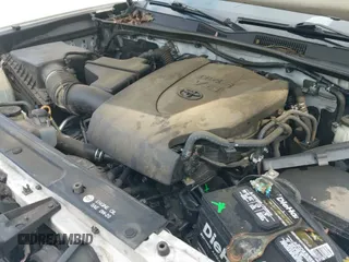 2019 Toyota Tacoma SR5 with VIN 3TMAZ5CN9KM100595, listed as a IAAI auction lot 42473112 with 165,127 mi miles and . Bid and sale history available at DreamBid. Image 19.