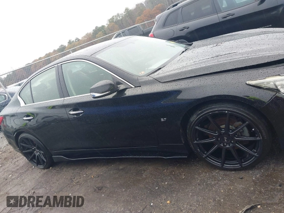 2014 Infiniti Q50 Sport with VIN JN1BV7AP4EM672256, listed as a IAAI auction lot 41016895 with 121,293 mi miles and . Bid and sale history available at DreamBid. Image 13.