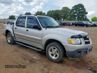 2005 Ford Explorer Sport Trac XLS with VIN 1FMZU67K95UA94980, listed as a Copart auction lot 63490315 with 126,737 mi miles and Salvage title. Bid and sale history available at DreamBid. Image 4.