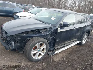 2011 BMW X6 35i with VIN 5UXFG2C58BLX08487, listed as a IAAI auction lot 41627394 with 999,999 mi miles. Bid and sale history available at carsss.com. Image 13.