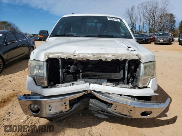 2014 Ford F-150 XL with VIN 1FTFW1CTXEFC60186, listed as a Copart auction lot 46981665 with 166,904 mi miles and Salvage Title. Bid and sale history available at carsss.com. Image 5.