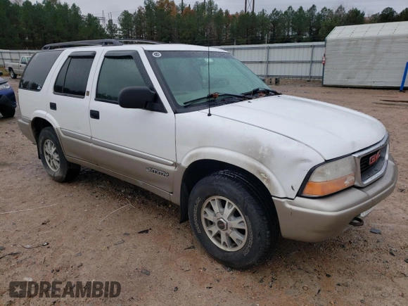 2001 GMC Jimmy SLT with VIN 1GKDT13W712155718, listed as a Copart auction lot 80688554 with 114,116 mi miles and Salvage Title. Bid and sale history available at carsss.com. Image 4.