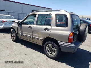 2002 Chevrolet Tracker z VIN 2CNBJ13C026951435, wystawiony jako Copart lot #57782784 z przebiegiem 132 279 mil mil oraz Szkody całkowita. Historia ofert i sprzedaży dostępna na DreamBid. Obrazek 2.