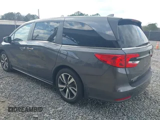 2023 Honda Odyssey Touring with VIN 5FNRL6H86PB065670, listed as a IAAI auction lot 41691093 with 22,518 mi miles and . Bid and sale history available at DreamBid. Image 3.