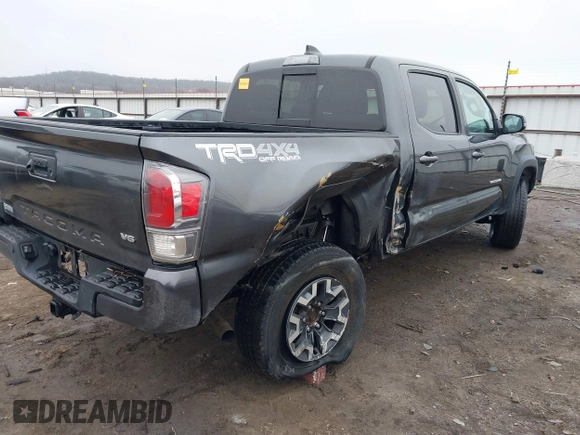 2022 Toyota Tacoma SR with VIN 3TMCZ5AN4NM476170, listed as a IAAI auction lot 41482149 with 57,126 mi miles and . Bid and sale history available at DreamBid. Image 6.
