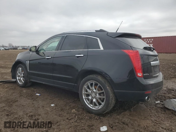 2014 Cadillac SRX Luxury Collection z VIN 3GYFNEE34ES685593, wystawiony jako Copart lot #52202805 z przebiegiem 139 869 mil mil oraz Szkoda całkowita • Salvage title. Historia ofert i sprzedaży dostępna na DreamBid. Obrazek 2.
