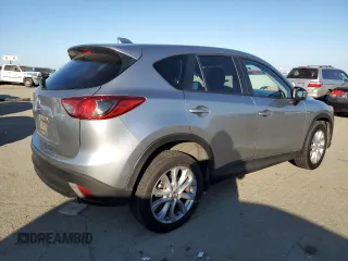 2014 Mazda CX-5 Grand Touring with VIN JM3KE2DY8E0412025, listed as a Copart auction lot 42863655 with 72,416 mi miles and Salvage Title. Bid and sale history available at carsss.com. Image 3.