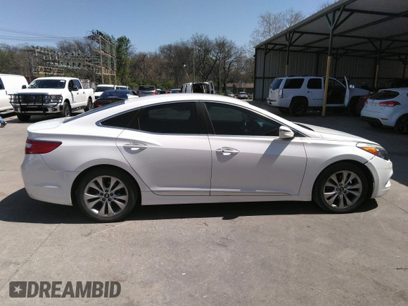 2014 Hyundai Azera with VIN KMHFG4JG8EA346609, listed as a IAAI auction lot 42010249 with 105,646 mi miles and . Bid and sale history available at DreamBid. Image 14.