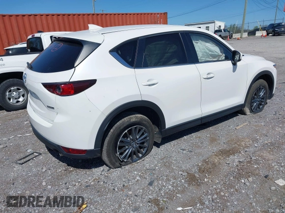2021 Mazda CX-5 Touring z VIN JM3KFBCM2M1395663, wystawiony jako IAAI lot #41948073 z przebiegiem 47 029 mil mil oraz . Historia ofert i sprzedaży dostępna na DreamBid. Obrazek 4.