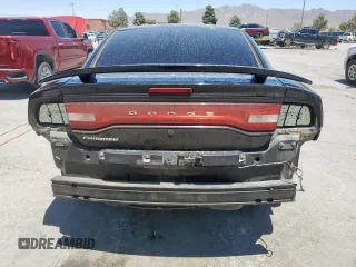 2013 Dodge Charger Police z VIN 2C3CDXAT2DH722403, wystawiony jako Copart lot #59879245 z przebiegiem 195 730 mil mil oraz Szkoda całkowita • Salvage title. Historia ofert i sprzedaży dostępna na DreamBid. Obrazek 6.