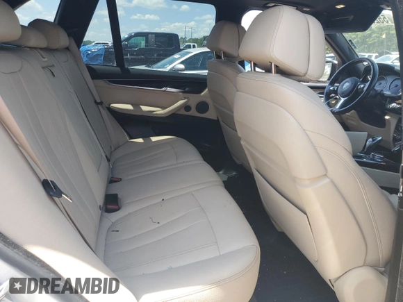 2017 BMW X5 sDrive35i z VIN 5UXKR2C3XH0U23288, wystawiony jako Copart lot #55292445 z przebiegiem 117 562 mil mil oraz Szkoda całkowita • Salvage title. Historia ofert i sprzedaży dostępna na DreamBid. Obrazek 10.