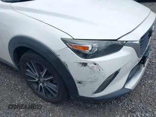 2018 Mazda CX-3 Touring with VIN JM1DKFC71J0315074, listed as a IAAI auction lot 42029790 with 100,268 mi miles. Bid and sale history available at carsss.com. Image 6.