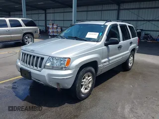2004 Jeep Grand Cherokee Laredo with VIN 1J4GX48S34C258227, listed as a IAAI auction lot 42616107 with 160,424 mi miles and . Bid and sale history available at DreamBid. Image 2.