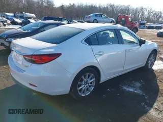 2015 Mazda 6 i Sport with VIN JM1GJ1U64F1171840, listed as a IAAI auction lot 41410088 with 129,691 mi miles and . Bid and sale history available at DreamBid. Image 4.