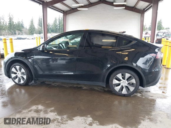 2023 Tesla Model Y Long Range with VIN 7SAYGAEE7PF739924, listed as a IAAI auction lot 41612323 with 75,226 mi miles and . Bid and sale history available at DreamBid. Image 13.