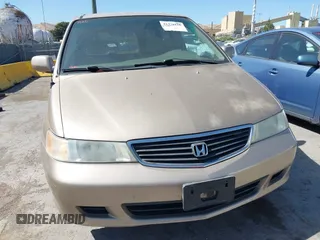 2001 Honda Odyssey EX with VIN 2HKRL18681H530346, listed as a IAAI auction lot 42371126 with 211,604 mi miles and . Bid and sale history available at DreamBid. Image 6.