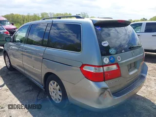 2006 Honda Odyssey EX-L with VIN 5FNRL38656B057877, listed as a IAAI auction lot 42199036 with 284,020 mi miles and . Bid and sale history available at carsss.com. Image 3.