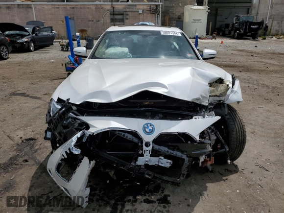 2023 BMW i4 eDrive35 with VIN WBY43AW02PFR38903, listed as a Copart auction lot 58691344 with 5,166 mi miles and Salvage Title. Bid and sale history available at carsss.com. Image 5.