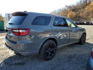 2023 Dodge Durango SRT Hellcat Premium z VIN 1C4SDJH92PC695631, wystawiony jako Copart lot #79218334 z przebiegiem Nie podano mil oraz Szkoda całkowita • Salvage title. Historia ofert i sprzedaży dostępna na DreamBid. Obrazek 3.