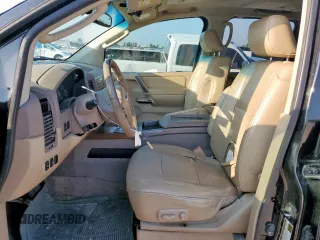2008 Nissan Titan with VIN 1N6BA07F08N310449, listed as a Copart auction lot 58926115 with 323,607 mi miles and Salvage title. Bid and sale history available at DreamBid. Image 7.