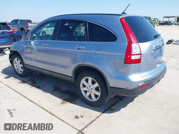 2009 Honda CR-V EX-L with VIN JHLRE38719C001393, listed as a IAAI auction lot 41884431 with 186,677 mi miles and . Bid and sale history available at carsss.com. Image 3.