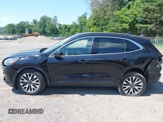 2020 Ford Escape Titanium with VIN 1FMCU9J92LUA27373, listed as a IAAI auction lot 42650077 with 42,179 mi miles and . Bid and sale history available at DreamBid. Image 15.