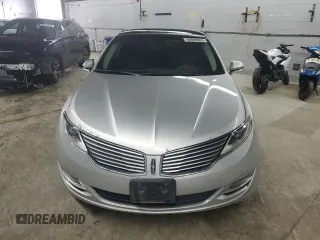 2013 Lincoln MKZ z VIN 3LN6L2GK8DR803824, wystawiony jako Copart lot #58899065 z przebiegiem 136 762 mil mil oraz Tytuł czysty. Historia ofert i sprzedaży dostępna na DreamBid. Obrazek 5.