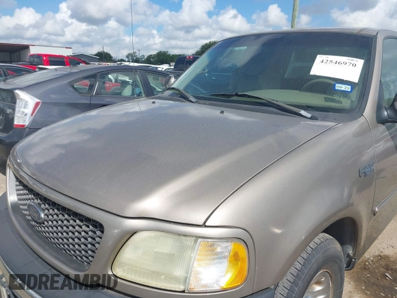 2002 Ford F-150 XL with VIN 1FTRX17222NA12740, listed as a IAAI auction lot 42546970 with 163,344 mi miles and . Bid and sale history available at DreamBid. Image 6.