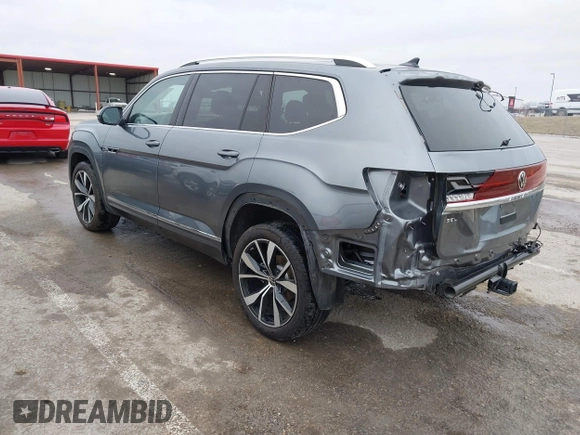 2024 Volkswagen Atlas SEL Premium R-Line z VIN 1V2FR2CA0RC523772, wystawiony jako IAAI lot #41544482 z przebiegiem 7 703 mil mil oraz . Historia ofert i sprzedaży dostępna na DreamBid. Obrazek 3.