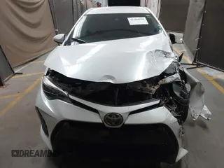 2017 Toyota Corolla L with VIN 5YFBURHE7HP693037, listed as a IAAI auction lot 42304020 with 117,710 mi miles and . Bid and sale history available at DreamBid. Image 13.