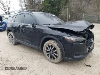 2018 Mazda CX-5 Grand Touring with VIN JM3KFBDM0J0327927, listed as a Copart auction lot 51800825 with 203,126 mi miles and Clean Title. Bid and sale history available at carsss.com. Image 4.