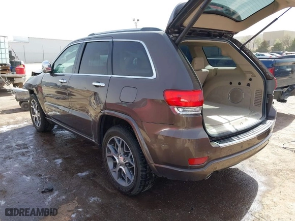 2020 Jeep Grand Cherokee Overland with VIN 1C4RJECG8LC323824, listed as a IAAI auction lot 41757922 with 64,792 mi miles. Bid and sale history available at carsss.com. Image 3.