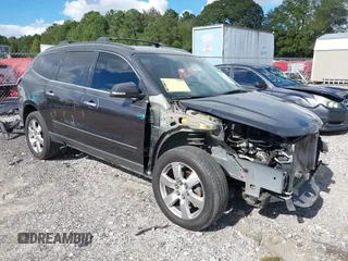 2016 Chevrolet Traverse LTZ z VIN 1GNKRJKD1GJ109695, wystawiony jako IAAI lot #40487593 z przebiegiem 106 994 mil mil oraz . Historia ofert i sprzedaży dostępna na DreamBid. Obrazek 1.