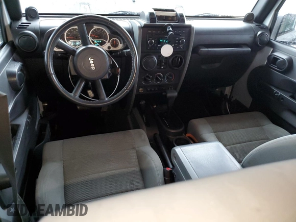 2007 Jeep Wrangler Unlimited Rubicon with VIN 1J4GA69187L127012, listed as a Copart auction lot 48818965 with 61,737 mi miles and Salvage title. Bid and sale history available at DreamBid. Image 8.