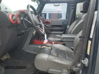 2007 Jeep Wrangler Unlimited Sahara with VIN 1J4GB59177L226122, listed as a Copart auction lot 55529575 with 208,811 mi miles and Salvage title. Bid and sale history available at DreamBid. Image 7.