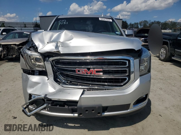 2016 GMC Yukon SLT with VIN 1GKS1BKC1GR413225, listed as a Copart auction lot 66547034 with 56,073 mi miles and Salvage Title. Bid and sale history available at carsss.com. Image 5.
