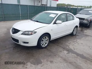 2008 Mazda 3 i Touring with VIN JM1BK32G981835454, listed as a IAAI auction lot 42073882 with 222,715 mi miles and . Bid and sale history available at carsss.com. Image 2.