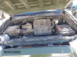 2021 Toyota Tacoma SR with VIN 3TYCZ5AN2MT039450, listed as a IAAI auction lot 40457613 with 54,176 mi miles and . Bid and sale history available at DreamBid. Image 10.