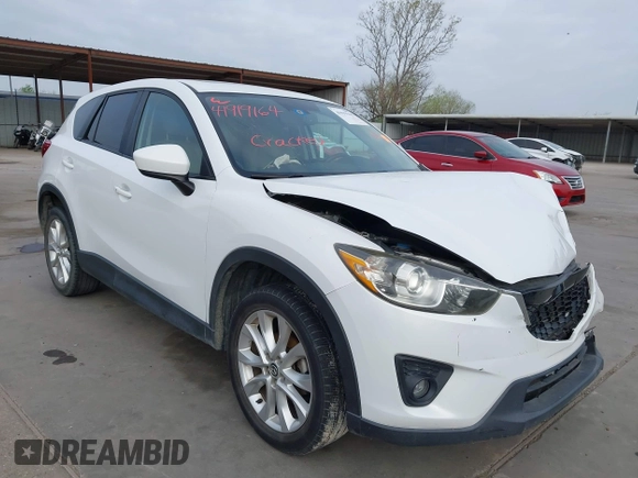 2013 Mazda CX-5 Grand Touring with VIN JM3KE2DEXD0166115, listed as a IAAI auction lot 41919164 with 102,999 mi miles and . Bid and sale history available at carsss.com. Image 1.