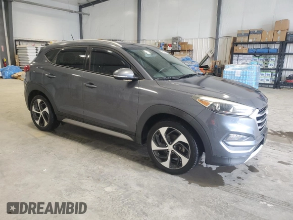 2017 Hyundai Tucson Sport with VIN KM8J3CA26HU346549, listed as a Copart auction lot 52741415 with 102,779 mi miles and Clean Title. Bid and sale history available at DreamBid. Image 4.