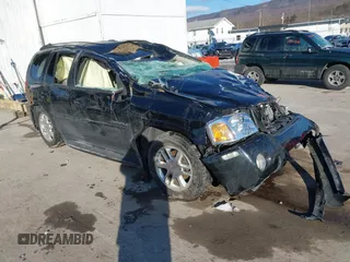 2007 GMC Envoy Denali with VIN 1GKET63M072227691, listed as a IAAI auction lot 41612371 with 154,001 mi miles. Bid and sale history available at carsss.com. Image 1.