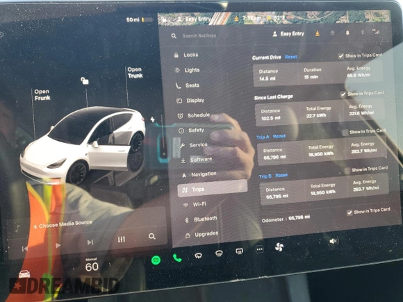 2022 Tesla Model Y Long Range with VIN 7SAYGAEE7NF376795, listed as a Copart auction lot 55113135 with 66,796 mi miles and Salvage Title. Bid and sale history available at carsss.com. Image 9.