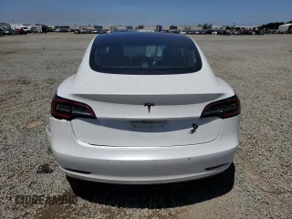2019 Tesla Model 3 Mid Range z VIN 5YJ3E1EA3KF402556, wystawiony jako Copart lot #56212875 z przebiegiem 89 022 mil mil oraz Szkoda całkowita • Salvage title. Historia ofert i sprzedaży dostępna na DreamBid. Obrazek 6.