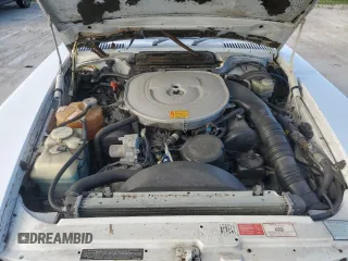 1989 Mercedes-Benz 560 SL with VIN WDBBA48DXKA096297, listed as a Copart auction lot 75597074 with 70,152 mi miles and Salvage Title. Bid and sale history available at DreamBid. Image 11.