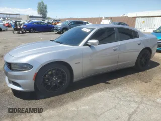 2015 Dodge Charger RT z VIN 2C3CDXCT8FH927515, wystawiony jako Copart lot #55750945 z przebiegiem 91 315 mil mil oraz Czysty tytuł • Clean title. Historia ofert i sprzedaży dostępna na DreamBid. Obrazek 1.