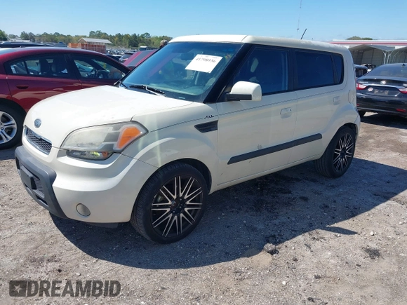 2010 Kia Soul + with VIN KNDJT2A24A7044597, listed as a IAAI auction lot 41798936 with 152,707 mi miles. Bid and sale history available at carsss.com. Image 2.