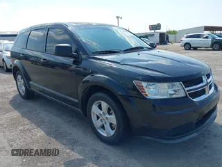 2013 Dodge Journey SE z VIN 3C4PDCAB8DT509671, wystawiony jako IAAI lot #42411776 z przebiegiem 131 129 mil mil oraz . Historia ofert i sprzedaży dostępna na DreamBid. Obrazek 1.