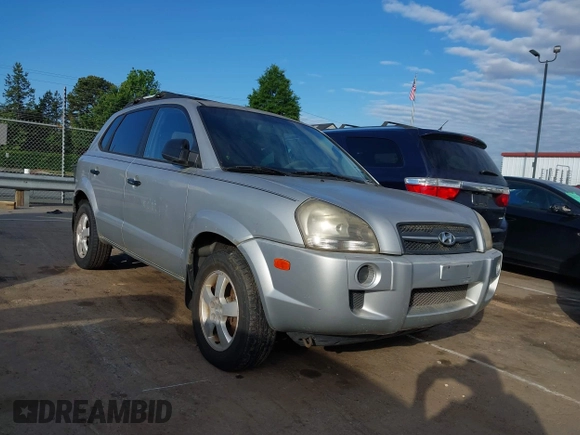 2006 Hyundai Tucson GL with VIN KM8JM12B26U469326, listed as a IAAI auction lot 42204742 with 240,998 mi miles. Bid and sale history available at carsss.com. Image 1.