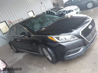 2016 Hyundai Sonata Hybrid SE with VIN KMHE24L12GA037983, listed as a IAAI auction lot 42078321 with 113,998 mi miles. Bid and sale history available at carsss.com. Image 13.